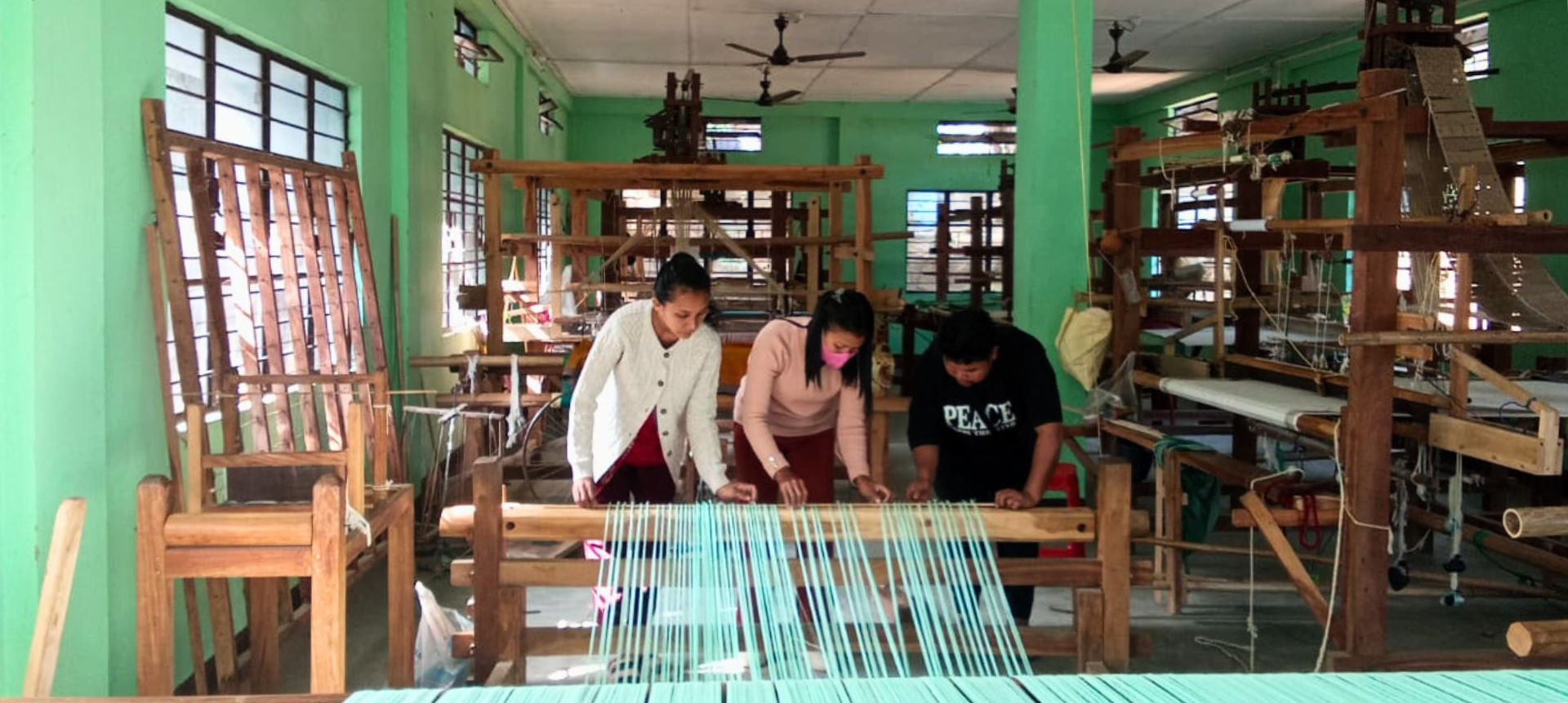 Hands-on weaving training session