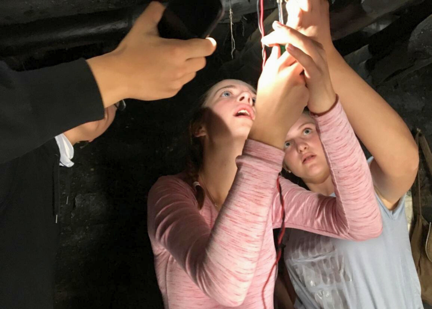 Fixing the solar lights inside the households of the villagers Fixing the solar lights inside the households of the villagers