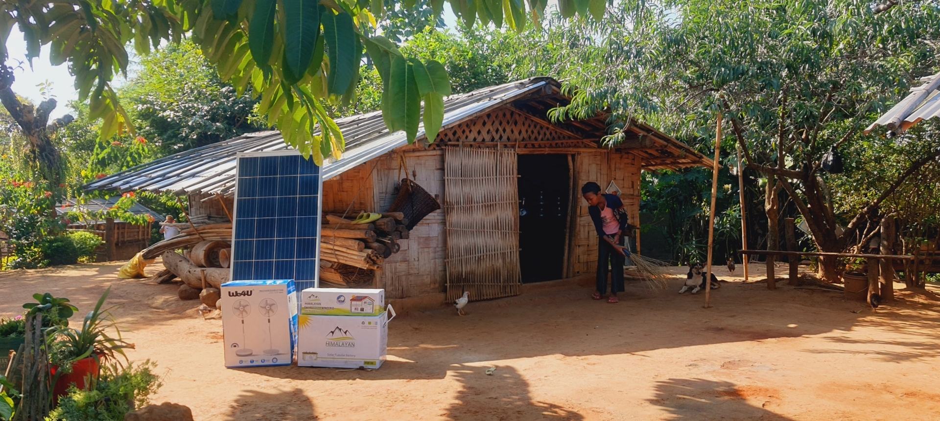 A rural household powered by a solar energy system, showcasing how clean energy access supports daily life and strengthens community resilience in remote villages